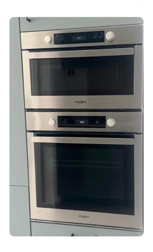 deux fours disposés côte à côte dans une cuisine dans l'établissement Tout équipé et rénové à neuf, au Cannet