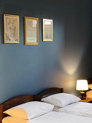 Un ou plusieurs lits dans un hébergement de l'établissement Savane hotel