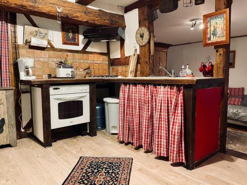 Kuchyň nebo kuchyňský kout v ubytování Gîte Le Chemin de Ronde