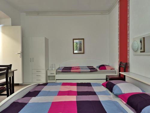 Postel nebo postele na pokoji v ubytování Apartment Luna