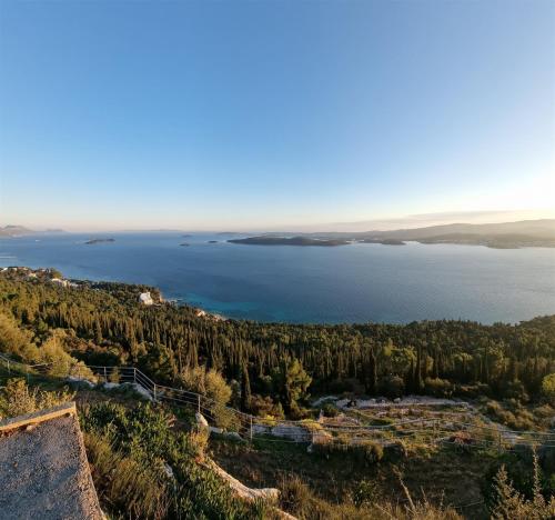 an aerial view of a lake with trees at Summer Park Residence Peljesac in Orebić
