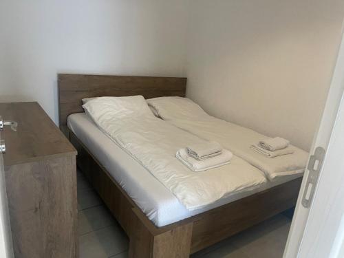 Ένα ή περισσότερα κρεβάτια σε δωμάτιο στο Lion King Neum