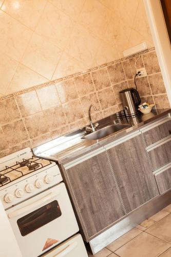 Dapur atau dapur kecil di Alameda Apart
