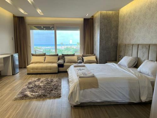 Ένα ή περισσότερα κρεβάτια σε δωμάτιο στο Hacienda bay