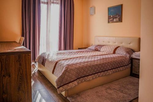 Postel nebo postele na pokoji v ubytování Апартамент Пирин Apartment Pirin