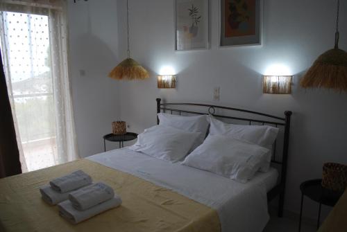Katil atau katil-katil dalam bilik di Sunset Rooms
