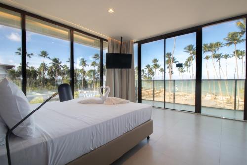 Postel nebo postele na pokoji v ubytování Maceio Mar Resort All Inclusive