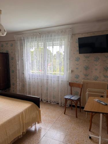Postel nebo postele na pokoji v ubytování Chez papi et mamie