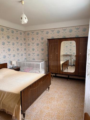 Postel nebo postele na pokoji v ubytování Chez papi et mamie