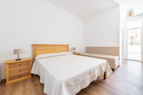 Letto o letti in una camera di Olbia Rooms