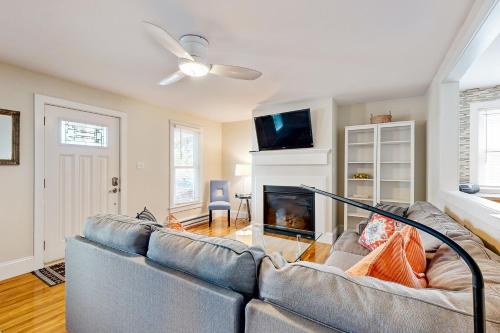 a living room with a couch and a fireplace at Town of Lewes --- 138 Washington Ave, Unit A in Lewes
