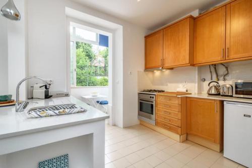 Køkken eller tekøkken på GuestReady - Cosy flat Santos-o-Velho