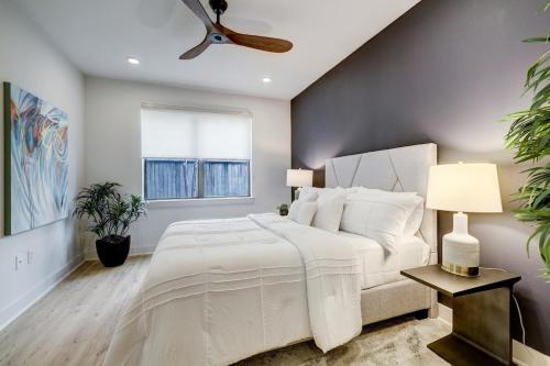a bedroom with a white bed and a window at UBP - Brand New Midtown Montrose 1 Bd Apt in Houston