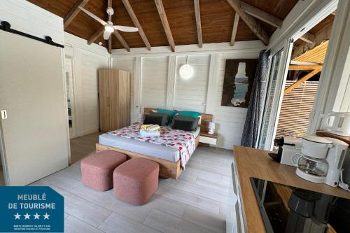 Postel nebo postele na pokoji v ubytování Suite Lagoon climatisée avec piscine, spa privatif