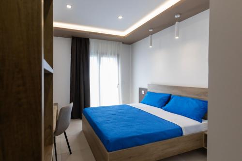 Postel nebo postele na pokoji v ubytování Altum Hotel Tropea