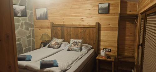 Postel nebo postele na pokoji v ubytování Algara hut