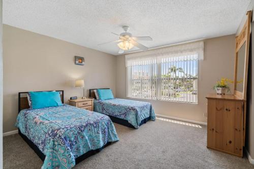 Ένα ή περισσότερα κρεβάτια σε δωμάτιο στο St Pete Vista Verde East 3 223 Spectacular Unit