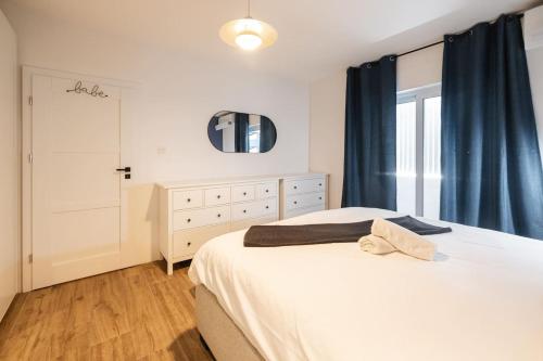 Ένα ή περισσότερα κρεβάτια σε δωμάτιο στο Rinella beach house