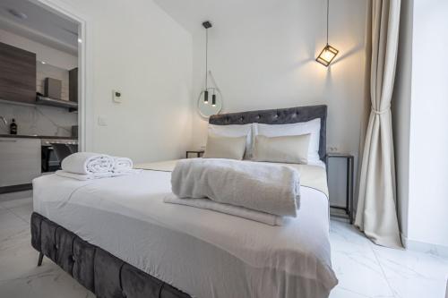 Ένα ή περισσότερα κρεβάτια σε δωμάτιο στο Villa Vita luxury Apartments