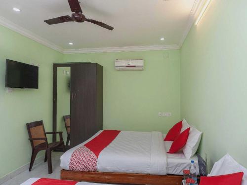 Postel nebo postele na pokoji v ubytování Hotel O Seabreeze Residency