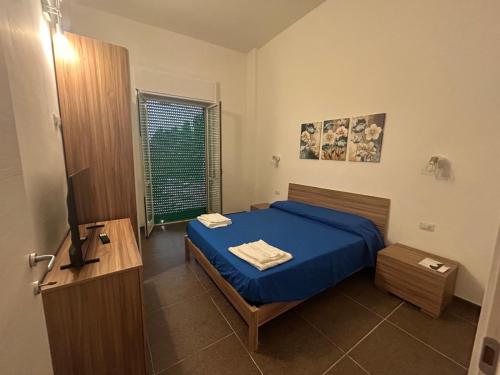 En eller flere senge i et værelse på La Dolce Vita Apartments Positano