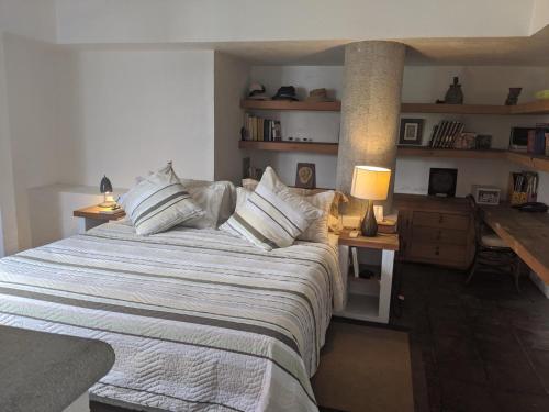 Ένα ή περισσότερα κρεβάτια σε δωμάτιο στο BELLISIMA CASA A 15 minutos de CUERNAVACA
