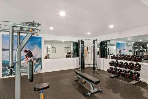 a gym with a lot of equipment in a room at Aston Maui Kaanapali Villas in Lahaina