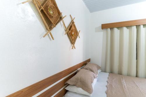 Postel nebo postele na pokoji v ubytování Hotel Coração Verde
