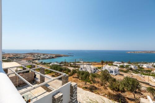a view of a city and the ocean at Sterna House Alkistis in Parikia