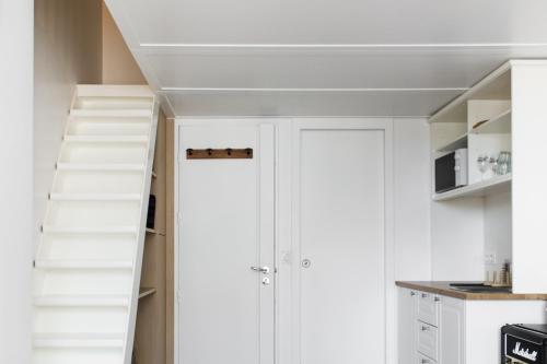 Η κουζίνα ή μικρή κουζίνα στο Pleasant 1BD Duplex for 4 Batignolles