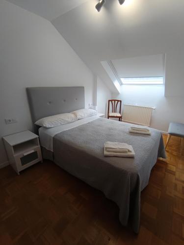 Katil atau katil-katil dalam bilik di Apartamento Moni