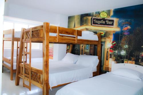 Postel nebo postele na pokoji v ubytování Hotel San Andres Arboletes