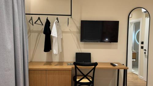 Televisyen dan/atau pusat hiburan di Serenity Rooms