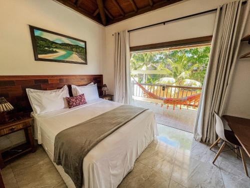 Voodi või voodid majutusasutuse Conchas do Mar Residence toas
