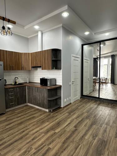 Η κουζίνα ή μικρή κουζίνα στο MAGNIT Apartments у самого моря