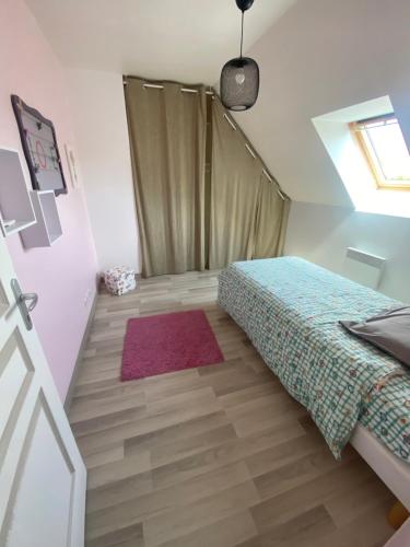 Postel nebo postele na pokoji v ubytování Maison à la campagne
