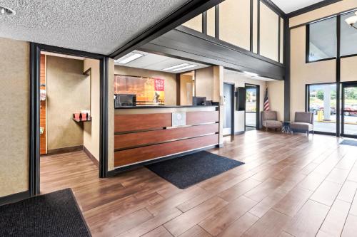 a lobby with a desk in a building at Red Lion Hotel Portland Airport in Portland