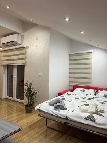 a bedroom with a large bed in a room at Luxury Apartment in Struga