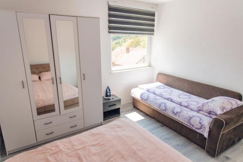 Postel nebo postele na pokoji v ubytování Apartman Marina