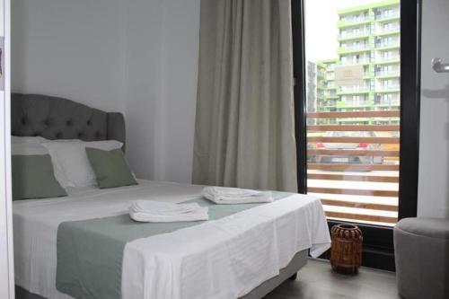 Postel nebo postele na pokoji v ubytování Bliss Residence - Sea View