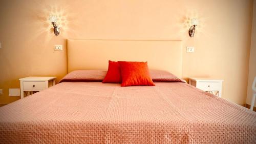 Una cama o camas en una habitación de Efebo Apartment