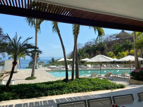 a view of the pool at the resort at Arena Bca in Cruz de Huanacaxtle
