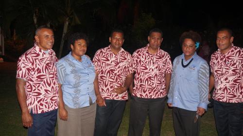 a group of men in hawaiian shirts posing for a picture at The Friendly North Inn in Labasa