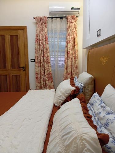 Cama o camas de una habitación en Mon Nid d'Or ABIDJAN CI