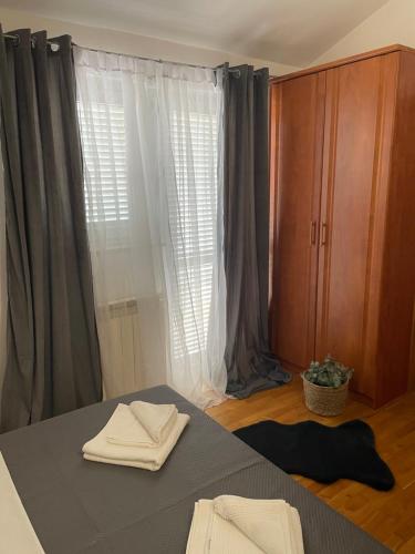 Postel nebo postele na pokoji v ubytování SanMari