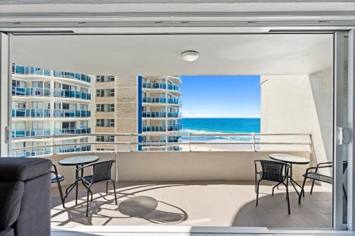 a view of the ocean from the balcony of a condo at Zenith Apartments - Q Stay in Gold Coast