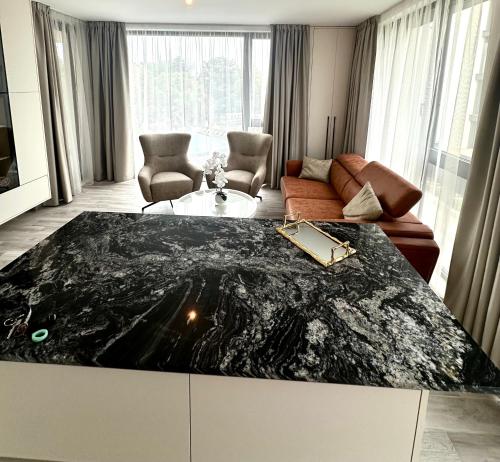 Χώρος καθιστικού στο Boutique luxury apartment Azur Deluxe resort On the beach