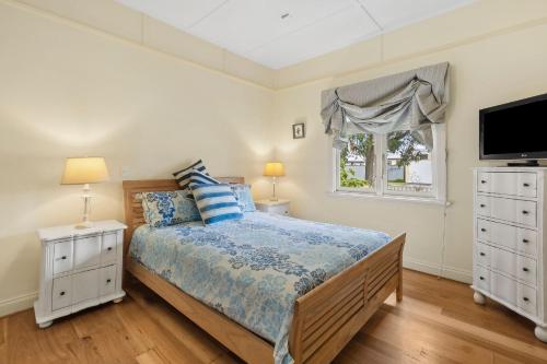 Кровать или кровати в номере Maison Cottage