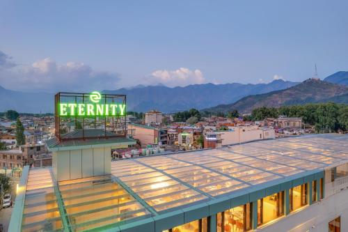 a sign on the top of a building at Eternity By Greenscape in Srinagar