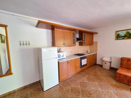 Η κουζίνα ή μικρή κουζίνα στο Ildiko Apartmanhaz